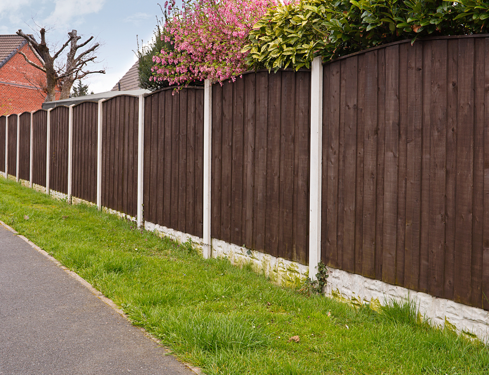 Choosing the Best Fence for Your Property in Greenville: Wood, Vinyl, Aluminum, or Chain Link?